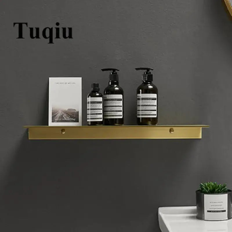Minimalist brushed gold bathroom shelf with two circular mounting holes decorbites brushed gold metal design