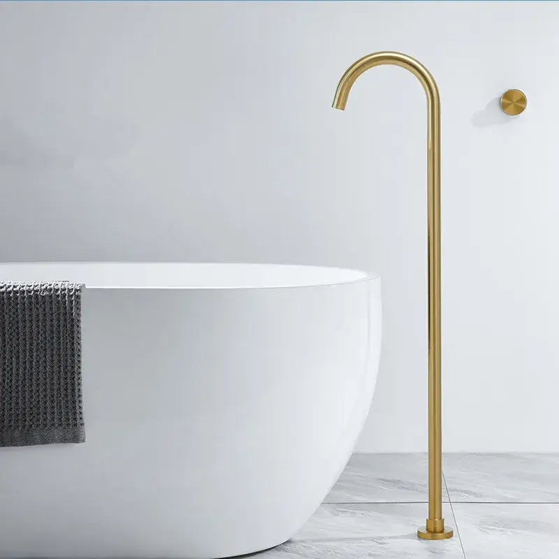 Minimalist brushed gold freestanding bathtub shower faucet with sleek curved spout and black accents for modern bathrooms