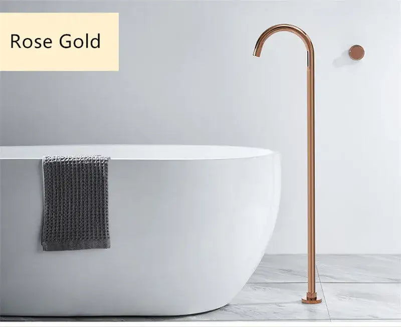 Minimalist rose gold freestanding bathtub shower faucet with sleek curved spout and brushed gold and black finish