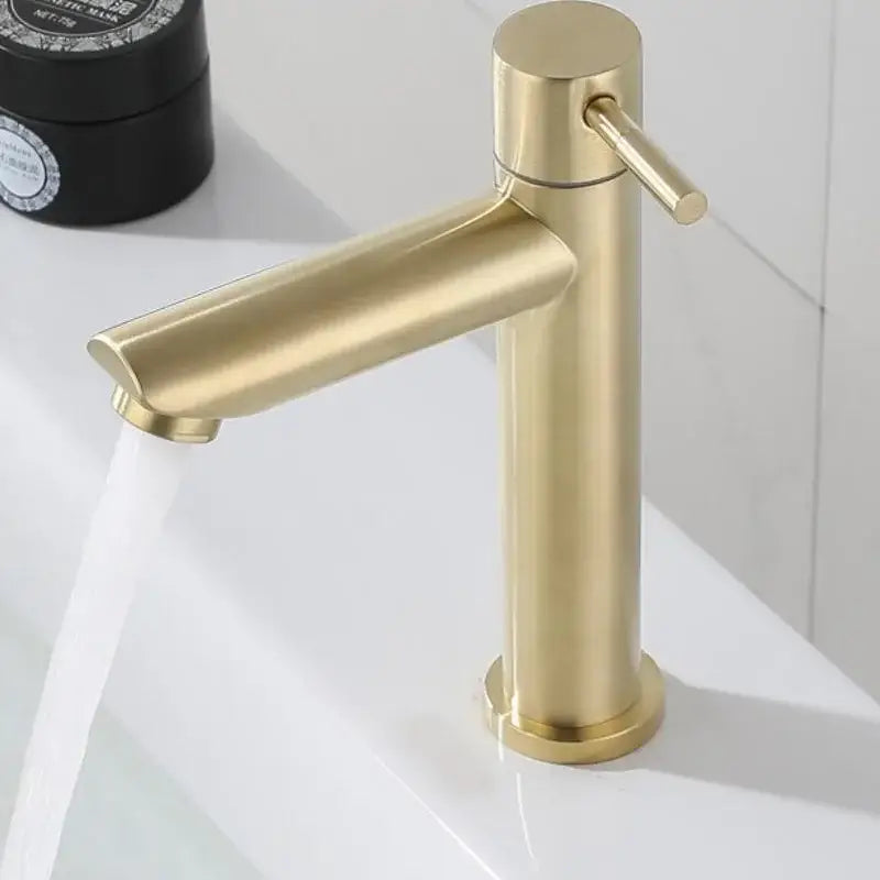 Minimalist brushed gold stainless steel single hole bathroom faucet with modern gold-toned single-handle design