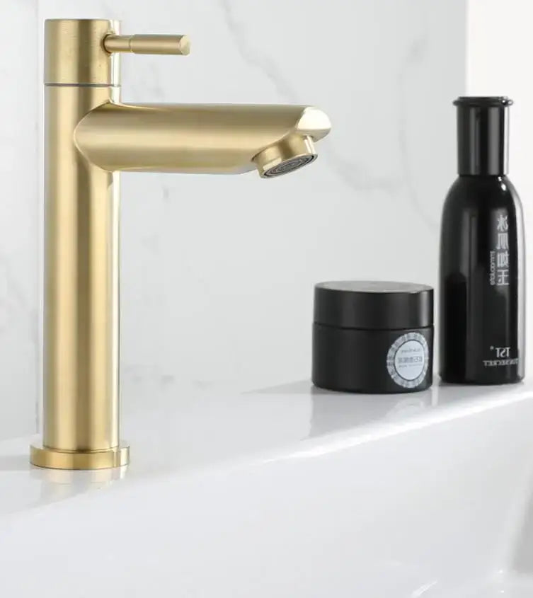 Minimalist brushed gold single hole bathroom faucet in stainless steel with a sleek modern single-handle design
