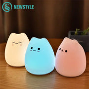Three minimalist cat silicone led night lights in cream blue and pink for bedroom decorbites cat silicone night light