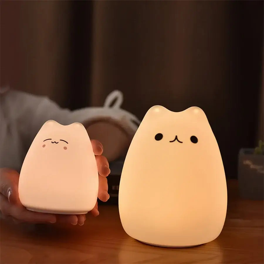 Two soft glowing minimalist cat silicone led night lights in 3 colors perfect as decorbites cat silicone night light