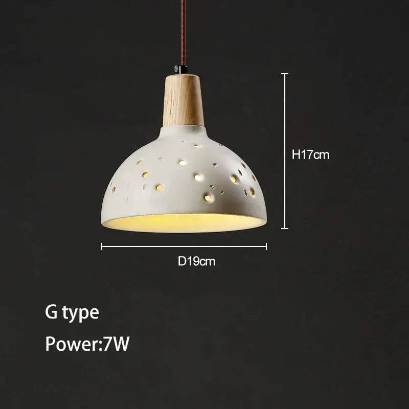 Minimalist white ceramic pendant chandelier with wooden top and circular cutouts for decorbites concrete ceiling hanging