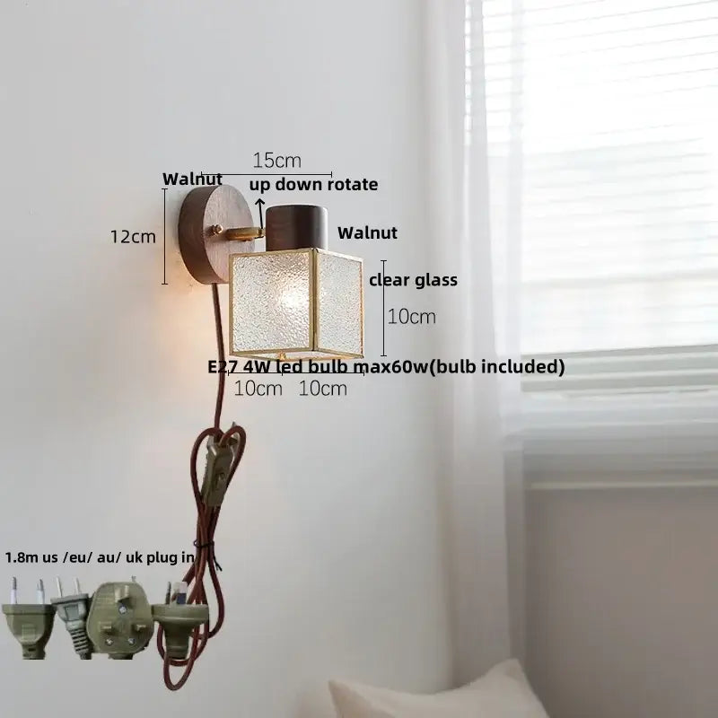 Walnut-finished wall light with clear textured glass cube and brass accents in decorbites ceramic walnut wood style