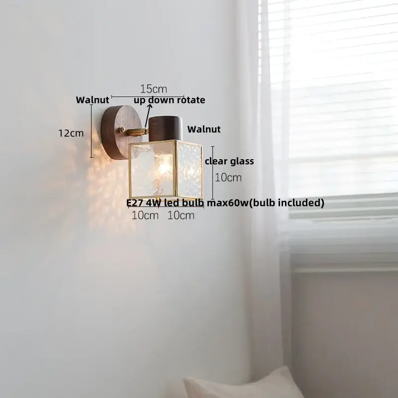 Minimalist ceramic walnut wood wall light with walnut finish brass accents and square clear glass shade for bedroom reading