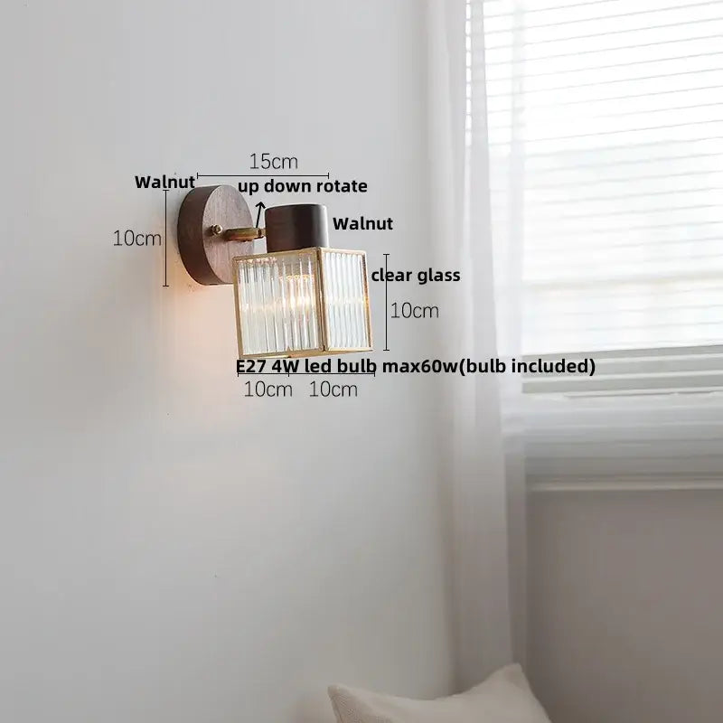Minimalist ceramic walnut wood wall light with walnut base brass accents and clear ridged glass for bedroom reading lamp decorbites ceramic walnut