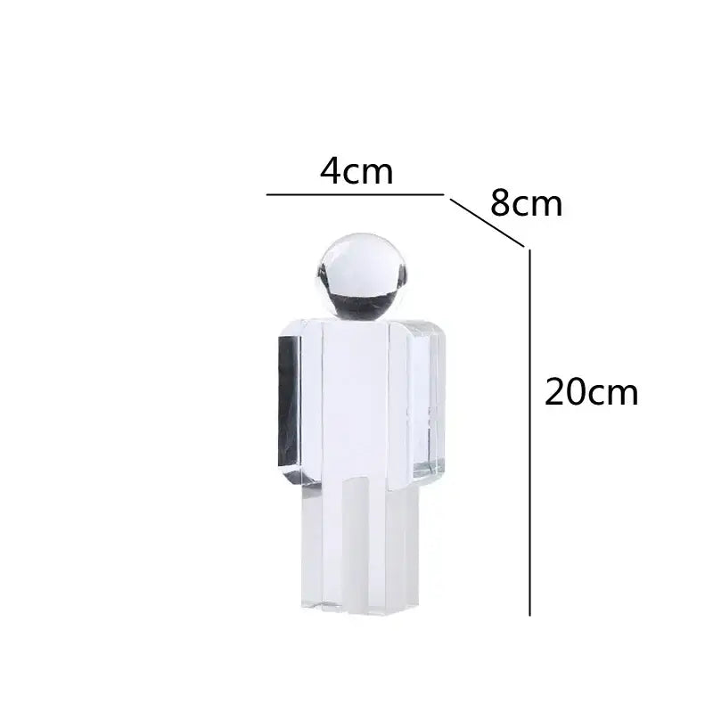 Minimalist decorbites crystal man statue featuring clear acrylic body with polished silver sphere head and black torso accents