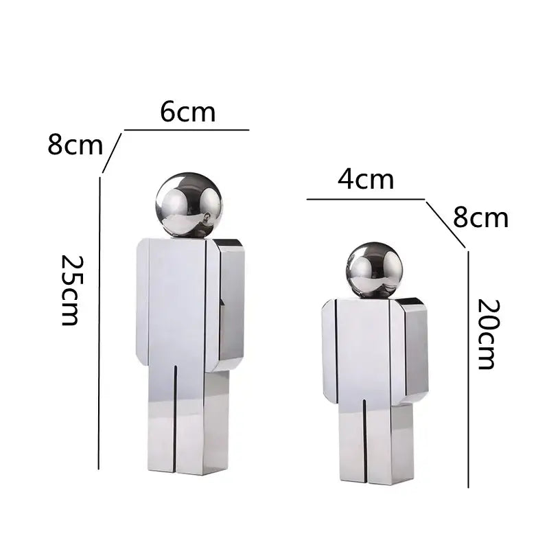 Two minimalist chrome decorbites crystal man statues with spherical heads and rectangular bodies for living room decor