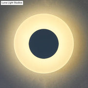 Minimalist circular led wall lamp with warm glowing outer ring and dark center ideal for living room backlit sconce 110v-120v 220v-240v wall lamp