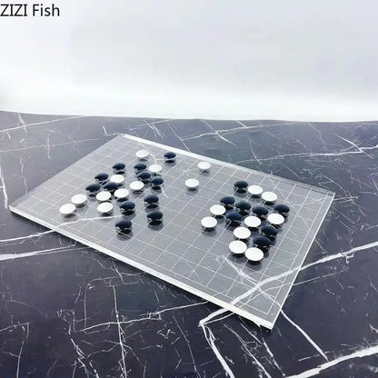 Minimalist clear acrylic geometric chess set with black and white stones for modern living room decorbites chess set