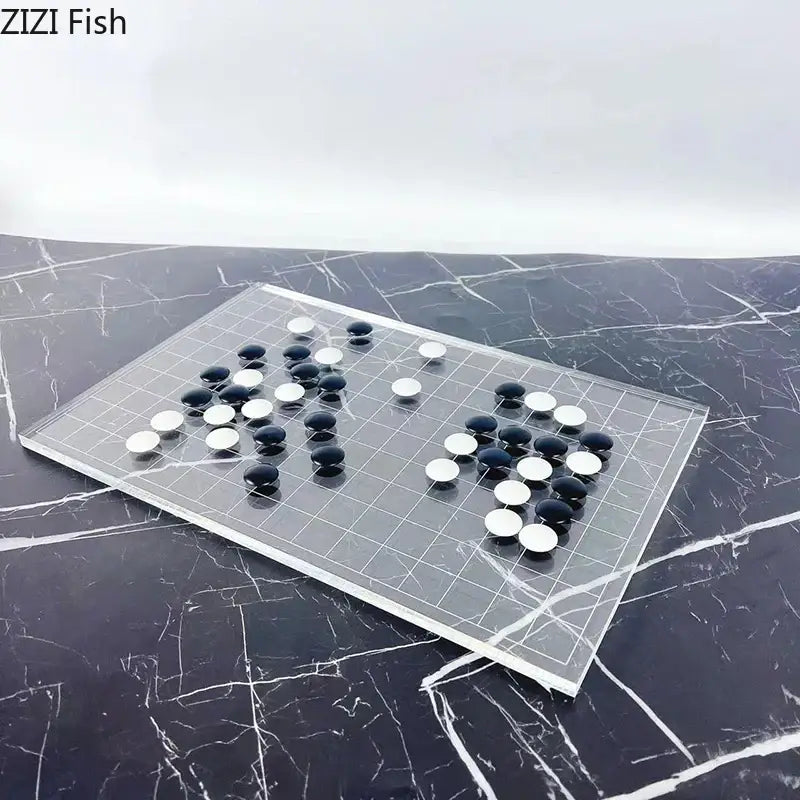 Minimalist clear acrylic geometric chess set with black and white stones for modern living room decorbites chess set