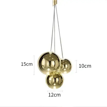 Minimalist gold-finished glass bubble led pendant light with three clear orbs for dining room decorbites glass bubble design