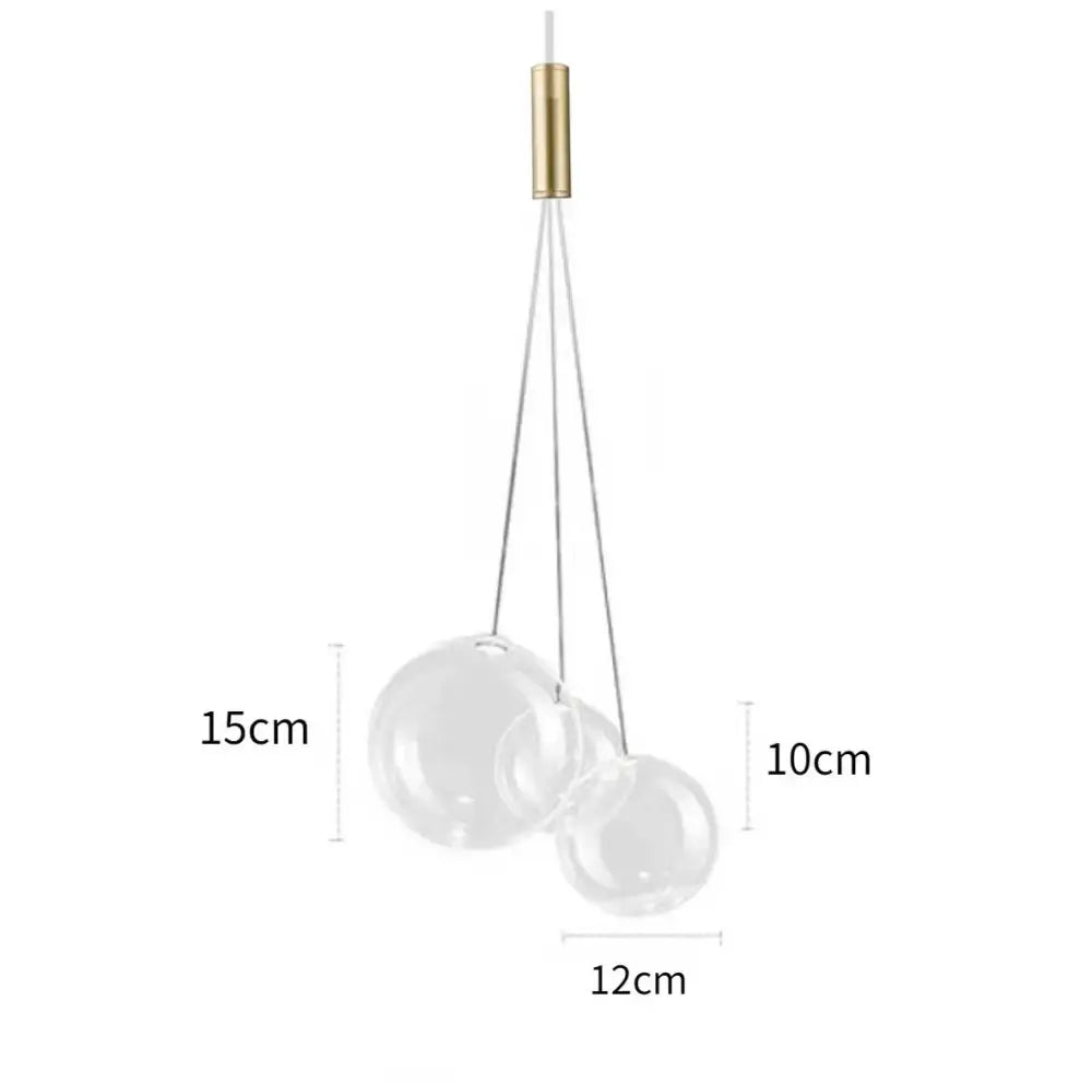 Minimalist clear glass bubble led pendant light with two transparent spheres and polished brass fixture for dining room decorbites glass bubble