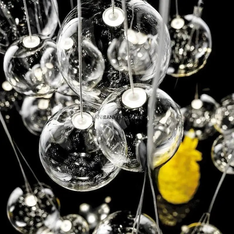 Minimalist clear glass bubble led pendant light with metallic fixtures for dining room decorbites glass bubble design