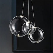 Minimalist clear glass bubble led pendant light with spherical design for dining room decorbites glass bubble led lighting