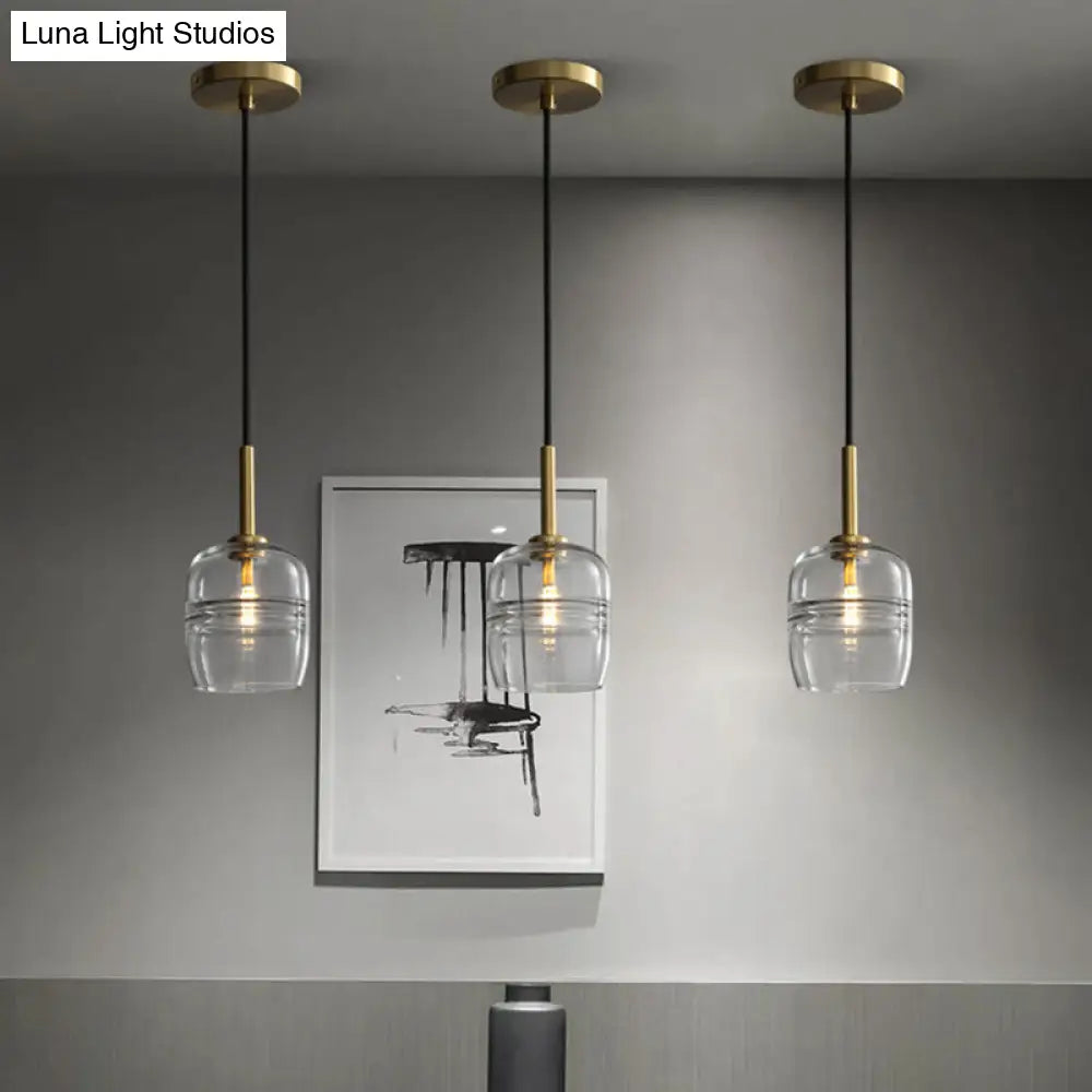 Minimalist Clear Glass Hanging Lamp with Brass Accent - LED Pendant Ceiling Light for Dining Room