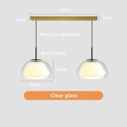 Modern minimalist jelly pendant lamp with clear glass domes and brass-finished bar for living room lighting
