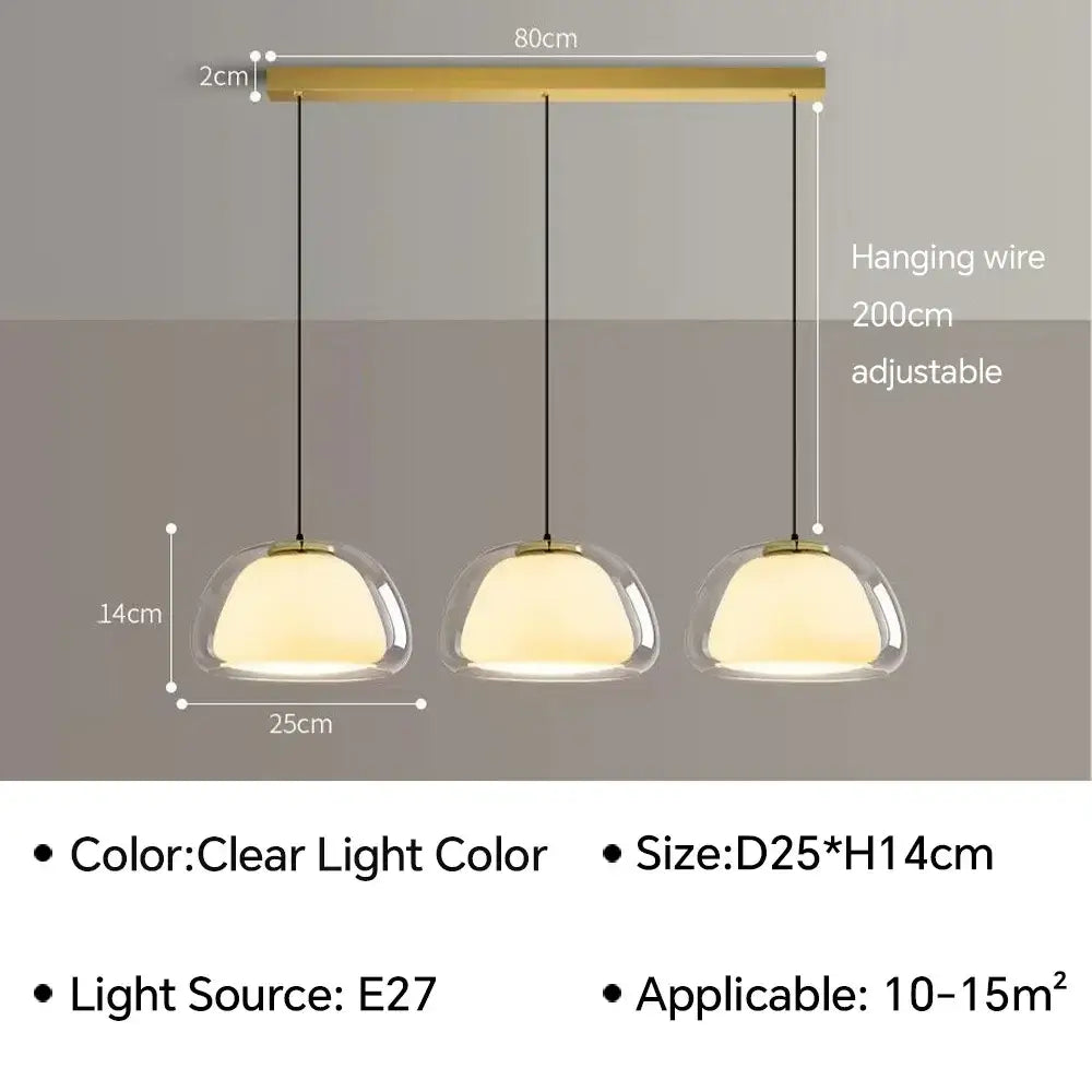 Modern three-light jelly pendant lamp with gold-toned bar and clear glass domes for living room lighting