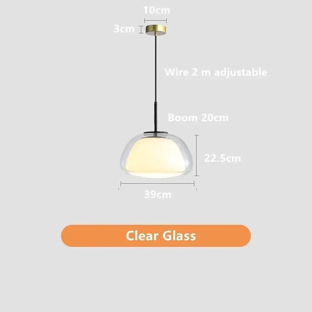 Minimalist jelly pendant lamp with clear glass dome, brass ceiling mount, and black wire for living room lighting
