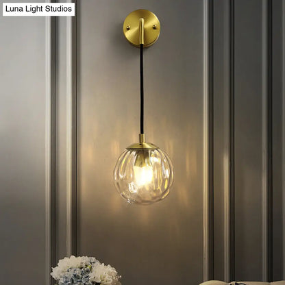 DecorBites™ DecorBites™ Minimalist Clear Ripple Glass Ball Wall Light: Brass Sconce Fixture for Dining Room