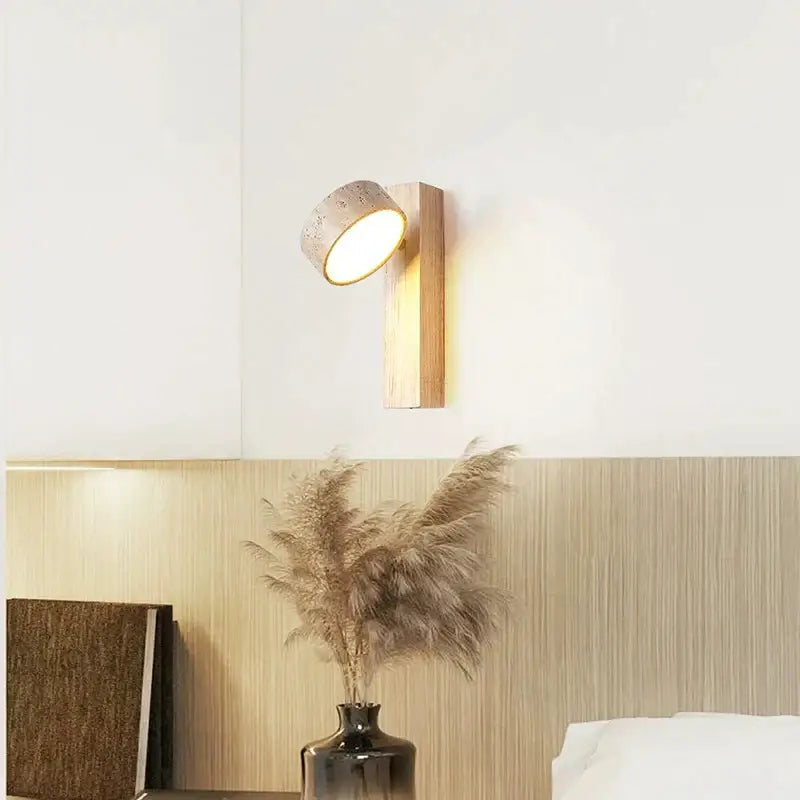Minimalist concrete and wood led light wall lamp with textured cream shade and warm lighting for bedroom decorbites cream style