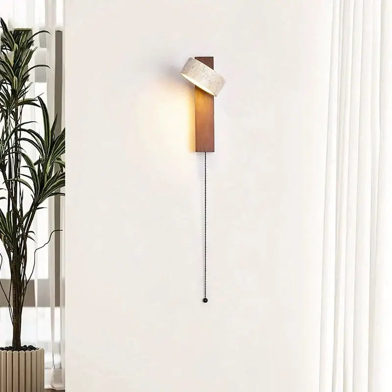 Minimalist concrete and wood led light wall lamp with warm wooden base and off-white textured fabric shade decorbites cream style