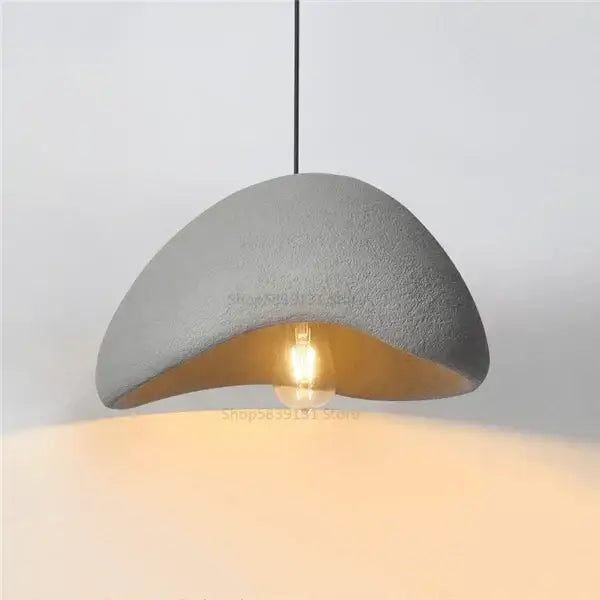 Gray concrete pendant light with warm exposed bulb from decorbites cobblestone pendant lights for dining room use