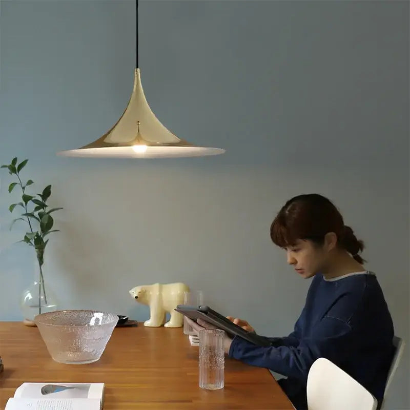 Cream-colored conical pendant light with sleek modern design for dining room decorbites horn chandelier pendant