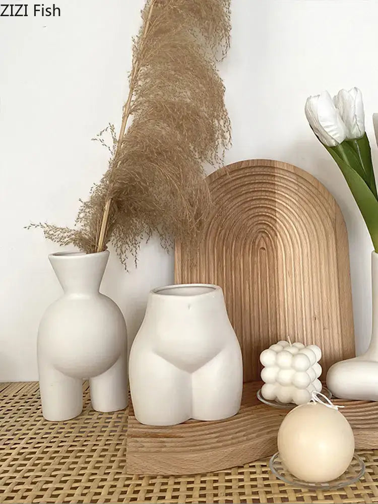 Minimalist cream ceramic human body vase with smooth rounded contours for abstract human decorbites bedroom decor