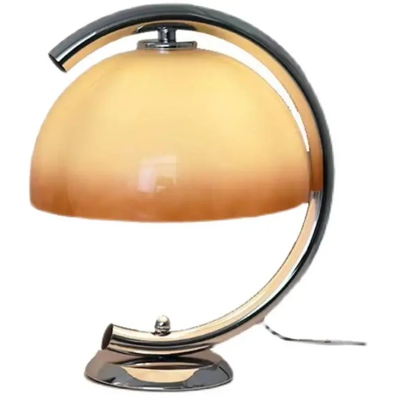 Minimalist cream bauhous mushroom table lamp with sleek chrome base and warm amber gradient glass dome for bedroom
