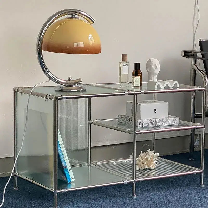 Minimalist cream bauhous mushroom table lamp with sleek curved chrome base and amber gradient glass shade for bedroom