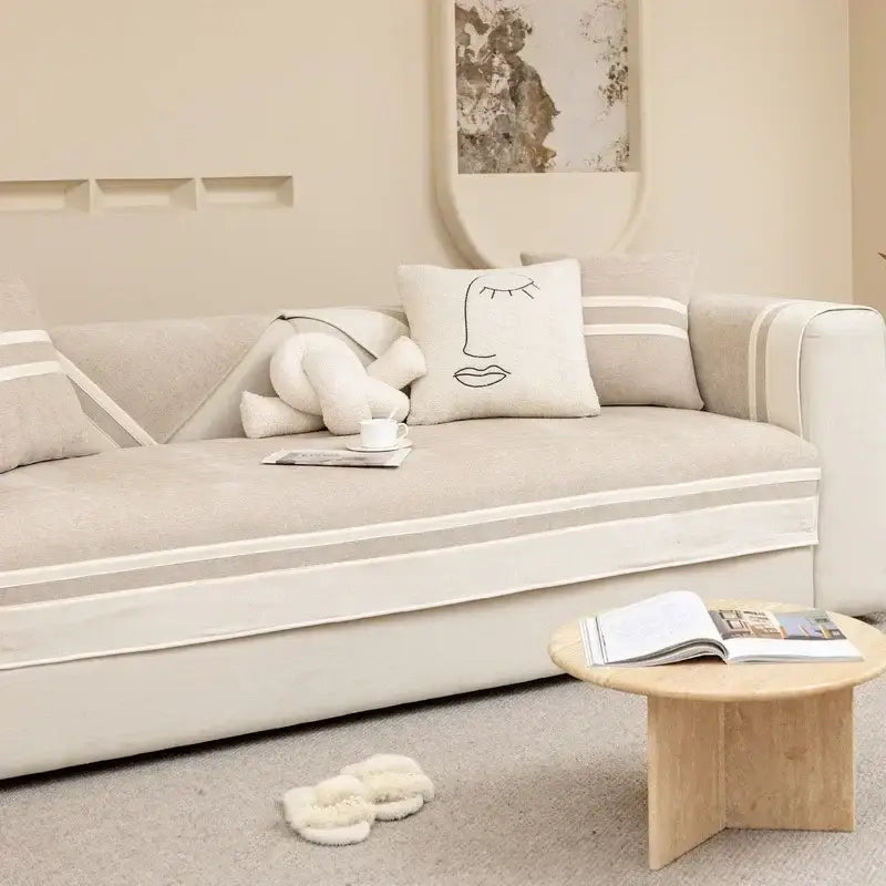 Beige linen sofa cover with cream-colored trim and minimalist design for living room cushion use