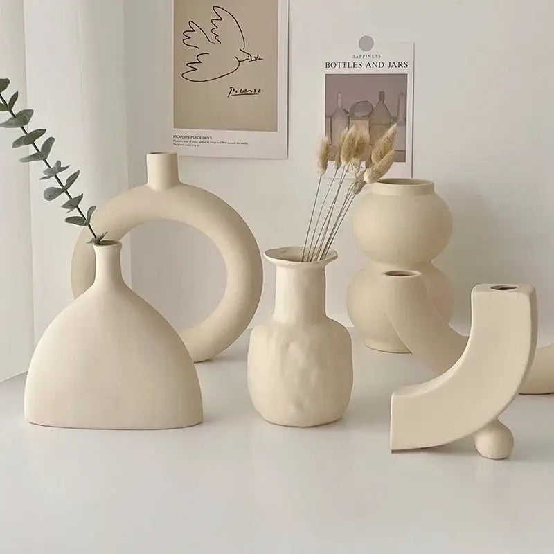 Cream-colored minimalist ceramic art vase by decorbites with sculptural design for living room decorbites ceramic art