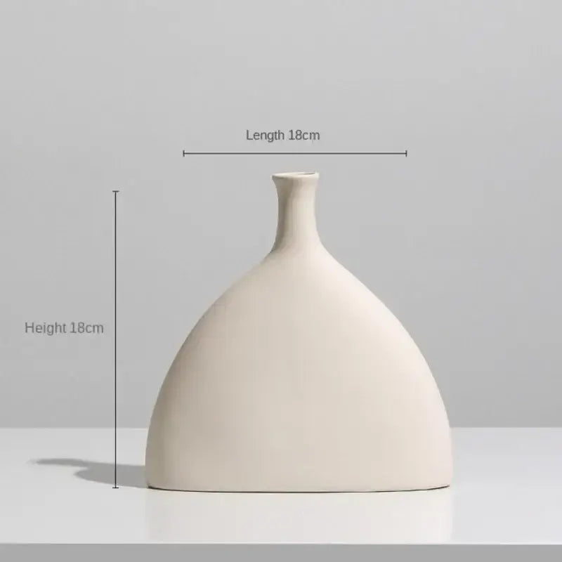 Minimalist cream ceramic art vase with a sleek bulbous body and slender neck for living room decorbites ceramic art decor
