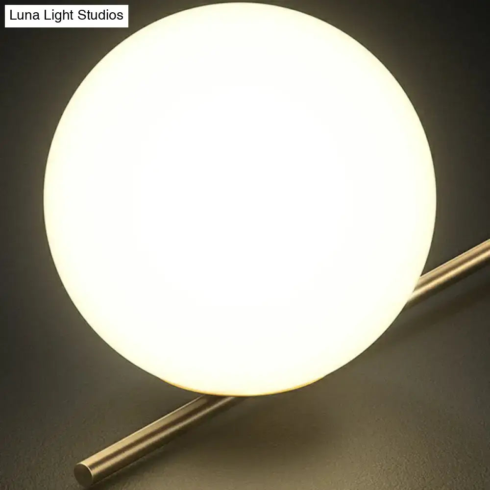 Modern table lamp with cream glass frosted globe and brass base for dining room globe island pendant light decorbites