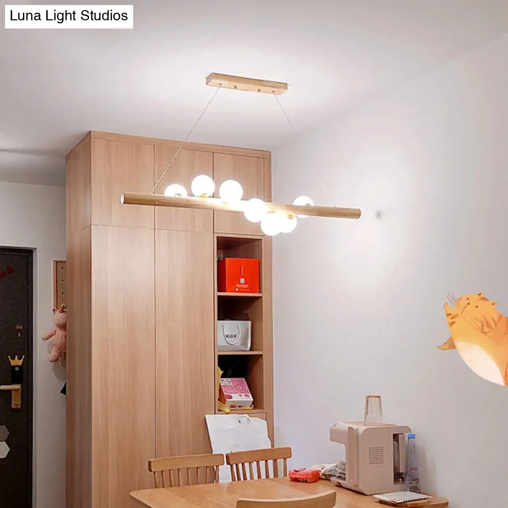 DecorBites™ Minimalist Cream Glass LED Pendant Light for Restaurants - Ball Island Ceiling Light with Wood Accent