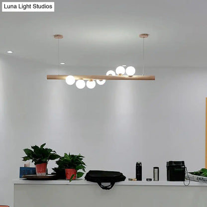 DecorBites™ Minimalist Cream Glass LED Pendant Light for Restaurants - Ball Island Ceiling Light with Wood Accent