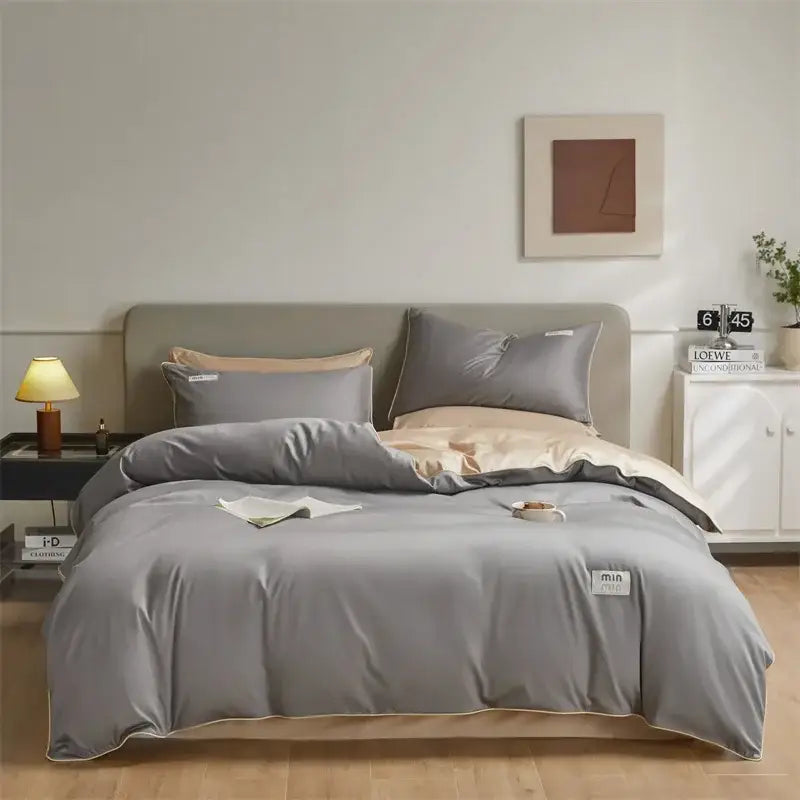 Gray egyptian cotton solid duvet cover bedding set with subtle beige trim and minimalist label detail