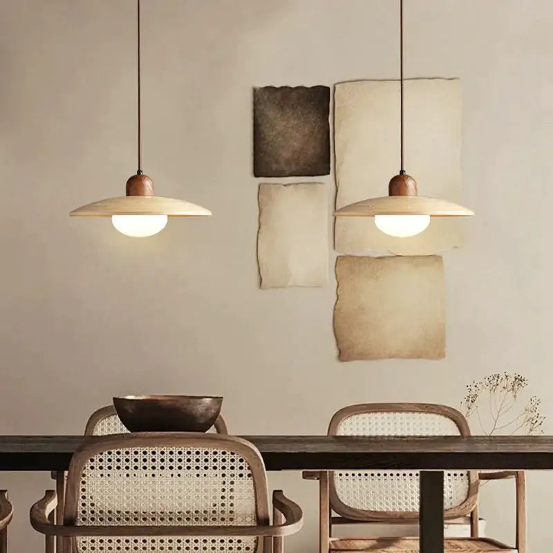 Two cream japanese style pendant chandelier lights with matte beige shades and warm glow for dining room decorbites cream japanese