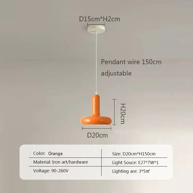 Orange iron art pendant light with sleek modern design complementing cream white ceramic dining room decorbites disc shaped light