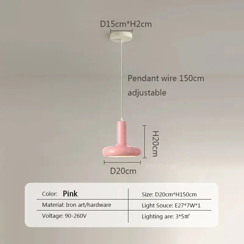 Pink ceramic pendant light with smooth rounded shade and iron hardware ideal for minimalist dining room decorbites disc shaped