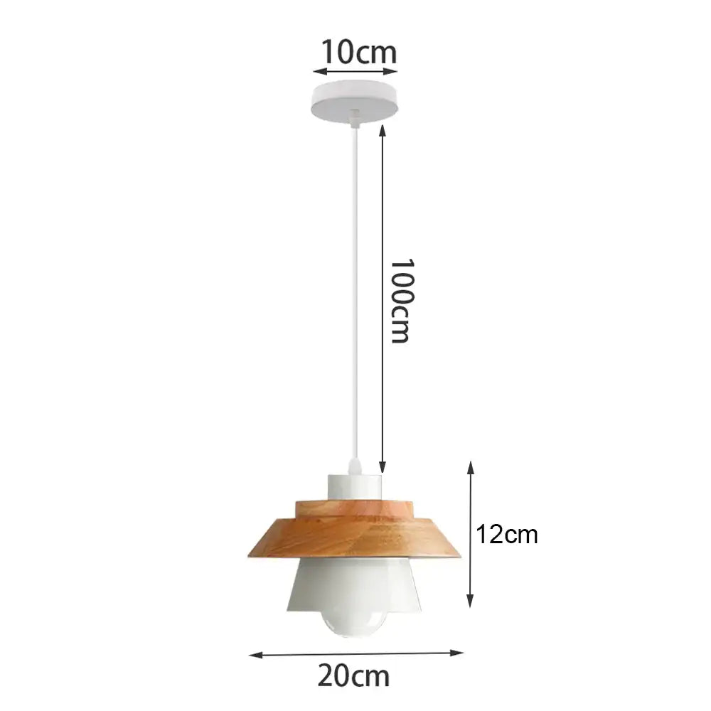 Minimalist pendant light with crisp white ceramic base and wood accent shade suspended by white cord for kitchen island