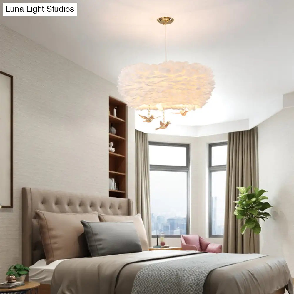 Lámpara colgante minimalista de cristal con forma de pájaro y diseño de nido de plumas