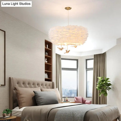 Lámpara colgante minimalista de cristal con forma de pájaro y diseño de nido de plumas