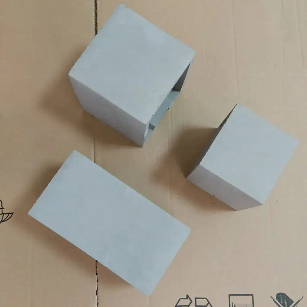 Minimalist light gray cube cuboid cement flush mount wall light with rectangular foam blocks for stairs