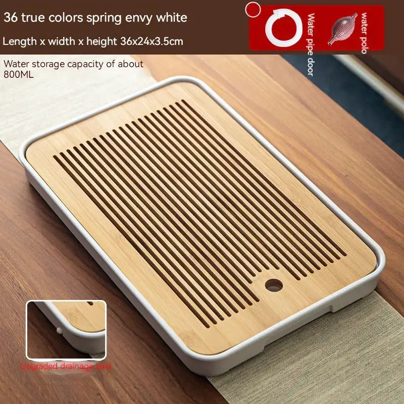 Minimalist dark brown and black bamboo tea tray with white plastic frame and slotted drainage design for dining room storage