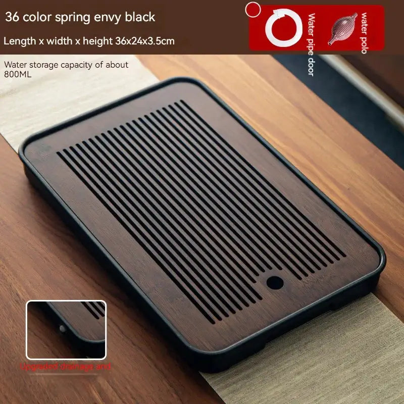 Minimalist dark brown and black bamboo tea tray with parallel slits for water drainage and dining room storage