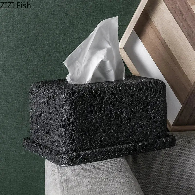 Minimalist dark gray concrete tissue box rack with a black volcanic rock textured tissue box for kitchen decor