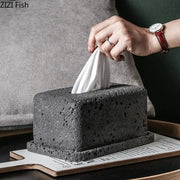 Minimalist dark gray concrete tissue box rack with textured finish and rectangular design for kitchen decor